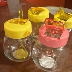 Set of Glass Jars with Yellow and Pink Lids